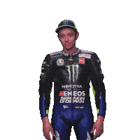 a motorcycle racer wearing a monster energy outfit