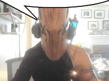 a person wearing headphones and a mask with a speech bubble above their head