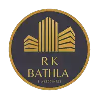 a logo for rk bathla and associates with a building in the middle