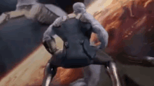 a statue of thanos from avengers : infinity war is doing a butt bump .