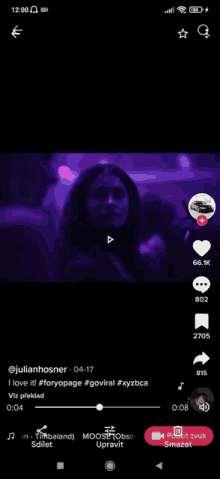 a screenshot of a tiktok video with a woman dancing