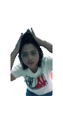 a girl wearing a white t-shirt with the letter a on it holds her head