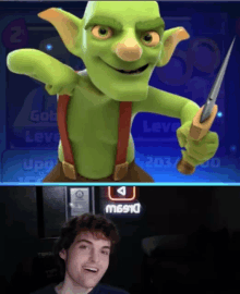 a video game screen shows a goblin holding a sword and a man smiling