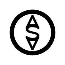 a black and white circle with a letter s inside of it