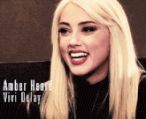 a close up of amber heard with the name vivi delay on the bottom