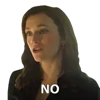 a woman in a black shirt says no on her chest