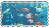 a group of fish are swimming in the ocean in a blurred image .