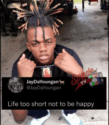 a picture of a young man with dreadlocks and a caption that says " life too short not to be happy "