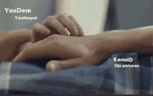 a close up of a person holding another person 's hand with the words kanald ojo pictures in the corner