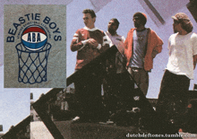 a group of men standing next to each other with a logo for the beastie boys aba basketball association