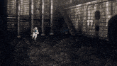 a black and white drawing of a man running in a dark room