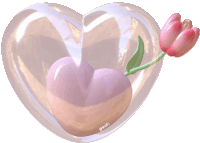 a heart shaped object with a flower inside of it