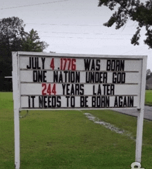 a sign that says july 4.1776 was born one nation under god 244 years later it needs to be born again