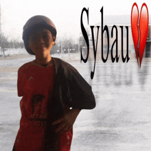 a boy wearing a red shirt that says " kitan tương lai "