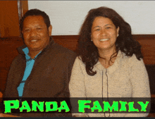 a man and a woman are posing for a picture with the words panda family written above them