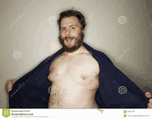 a shirtless man with a beard is taking off his jacket