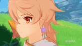 a close up of a girl 's face with the name sujikan below it