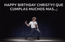 a man is dancing on a stage in spanish .