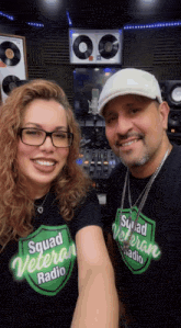 a man and woman wearing squad veteran radio shirts