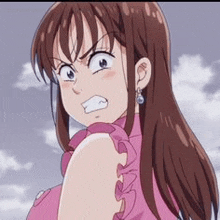 a girl with long brown hair is wearing a pink dress and earrings and making a funny face .