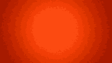 a close up of a red background that looks like a plain orange background .