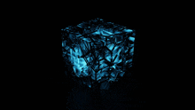 a blue cube with a black background is glowing