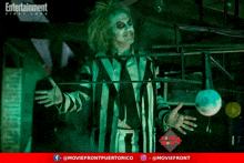 a poster for entertainment first look features a man dressed as beetlejuice