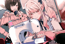 a girl is using a sewing machine while another girl looks on