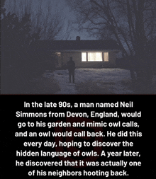 a man is standing in front of a house at night