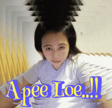 a woman in a white shirt with the word apee loe written on it