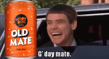 a can of moon dog old mate pale ale next to a man