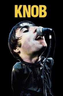 a poster of a man singing into a microphone with knob on it