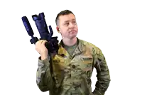 a man in a us army uniform is holding a camera over his shoulder