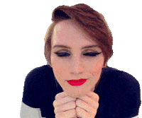 a woman with red lipstick is making a face with her hands on her face