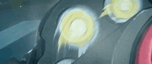 a close up of a cartoon character 's head with a yellow light coming out of it