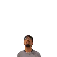 a man with a green cross on his head looks up