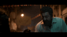 a man with a beard is standing in a dark alleyway with the word dard written on the bottom
