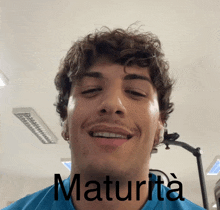 a picture of a man with the word maturita written on his face