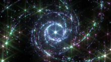 a purple and green swirl of lights on a dark background