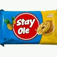 a bag of stay ole pineapple cookies with pineapple slices on the package .