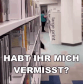 a sign in a library says large print on it