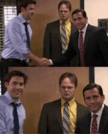 three men in suits and ties are shaking hands in an office