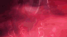 a close up of a person 's face with a red background