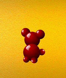 a yellow background with red balls in the shape of a mickey mouse