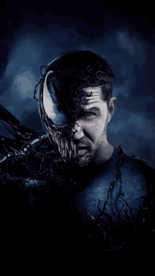 a movie poster for venom shows a man with a spider on his face