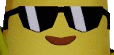 a close up of a banana wearing sunglasses and a smile .