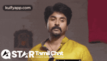 a man with a mustache is on a star tamil chat ad