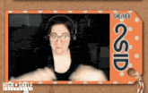 a picture of a woman wearing headphones and a tag that says she / her gsd