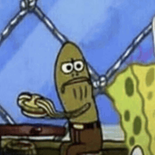 a cartoon character from spongebob squarepants is holding a plate of food in his hands .