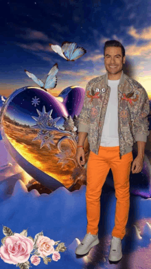 a man in orange pants is standing in front of a heart with butterflies flying around